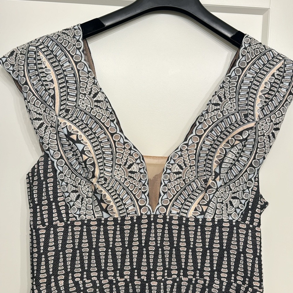 Size 8, BCBG mini dress, great condition, worn a few times